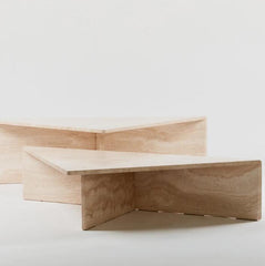 Triangular travertine coffee table