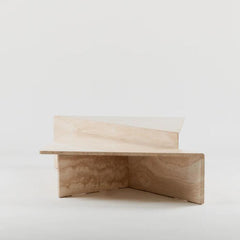 Triangular travertine coffee table